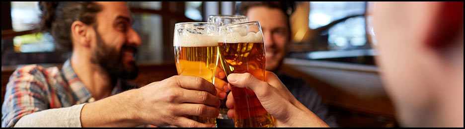 Men celebrating award winning beers at Altitude Chophouse & Brewery